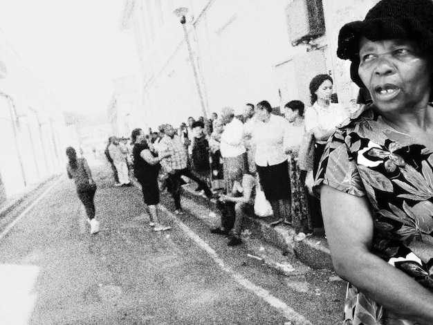 A historical photo from the Civil Rights era, showing a group of civil rights activists marching for voting rights, holding signs and banners. This serves as a reminder of the struggles and sacrifices made to secure voting rights for all Americans.