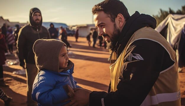 US border patrol agents assisting a family of refugees crossing the border into the United States. The agents are offering water and medical assistance.