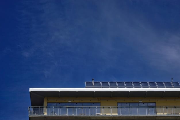 A wide shot of a commercial building rooftop covered in solar panels, under a clear blue sky. The image illustrates a business investing in renewable energy for long-term savings.