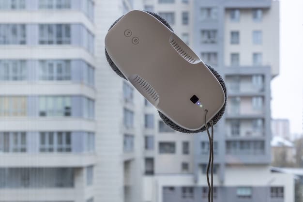 A close-up of an air quality monitor displaying high levels of particulate matter. The device is set against a blurred background of city traffic.